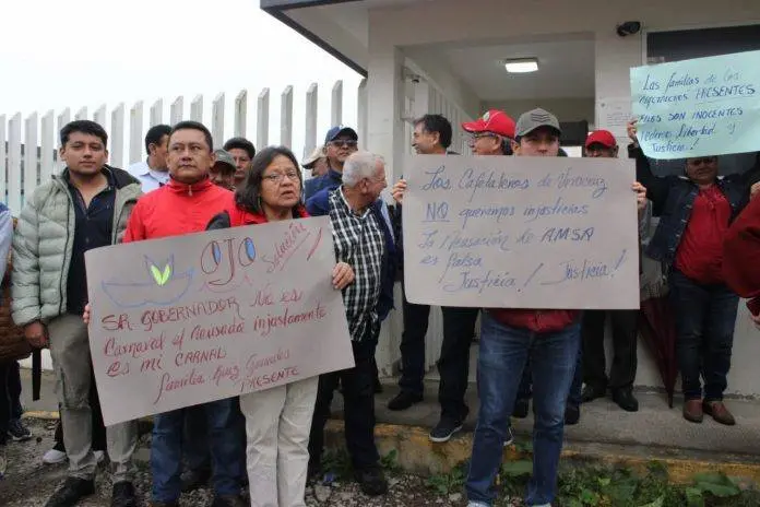 Cafetaleros son absueltos de acusaciones de provocar incendio en bodega de AMSA